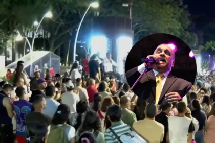 Multitud bailando salsa en el Bulevar del Río de Cali durante el homenaje a Willie Colón, con trombones y voces en vivo