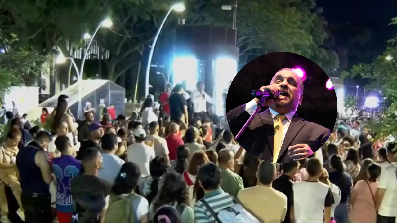 Multitud bailando salsa en el Bulevar del Río de Cali durante el homenaje a Willie Colón, con trombones y voces en vivo