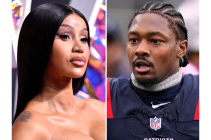 Cardi B en el escenario del Little Miss Drama Tour cantando 'Pretty & Petty' con micrófono en mano, defendiendo su relación con Stefon Diggs