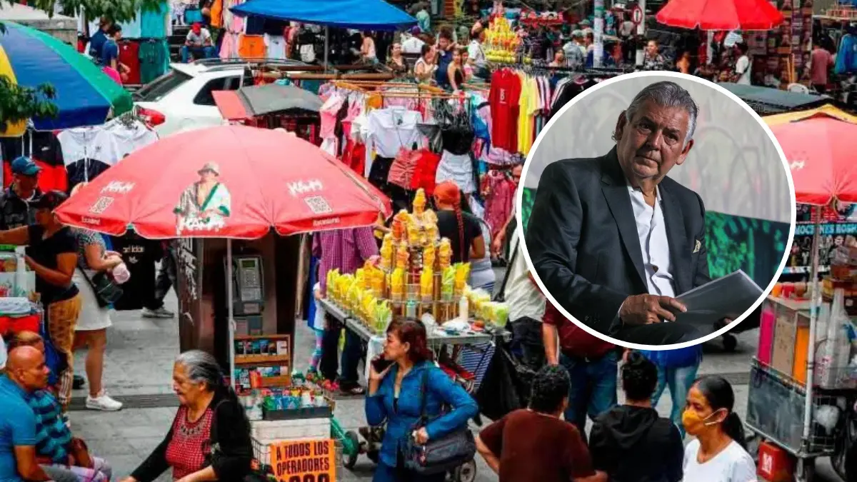 Empresario revisando planilla de empleados con gráficos de reducción de personal por aumento del salario mínimo en 2026