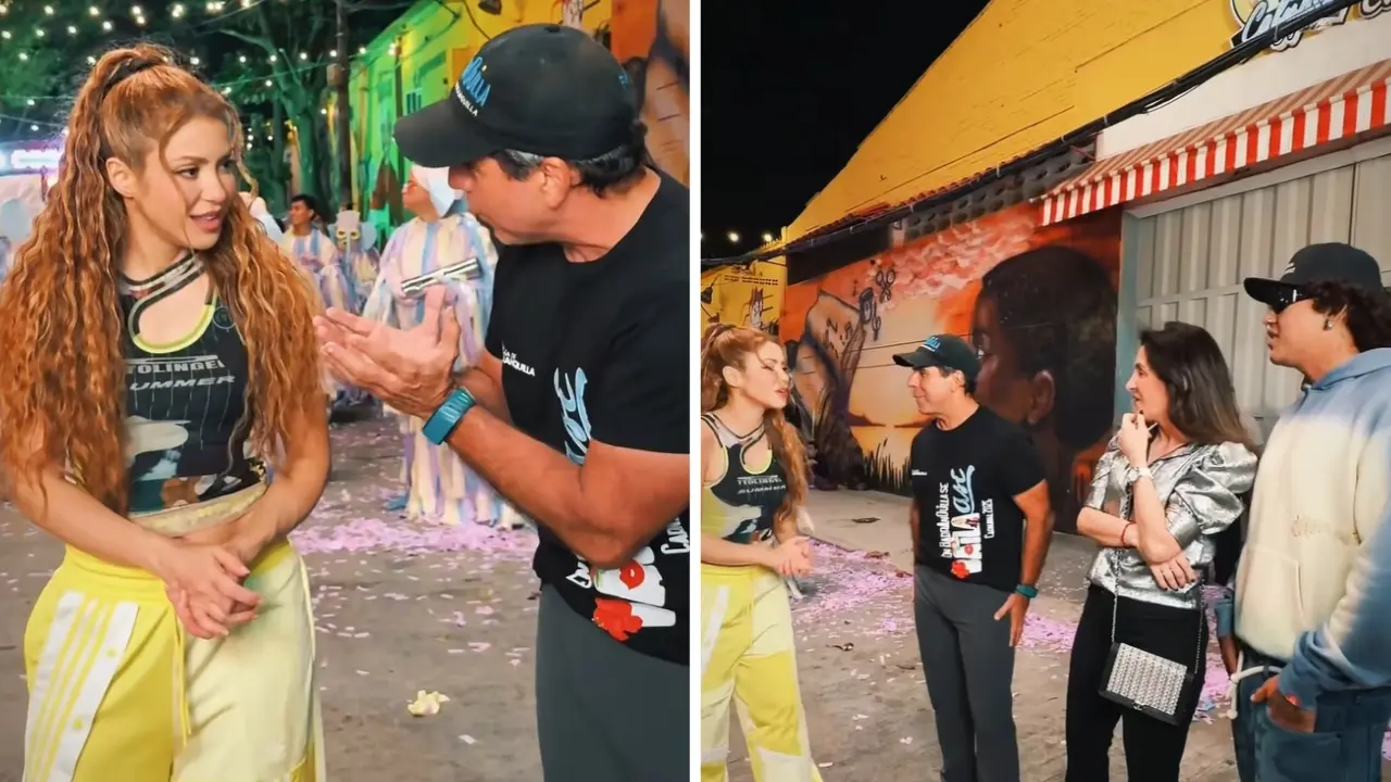 Shakira y Beéle filmando en el Barrio Abajo de Barranquilla, rodeados de comparsas y símbolos del Carnaval como marimondas y congos