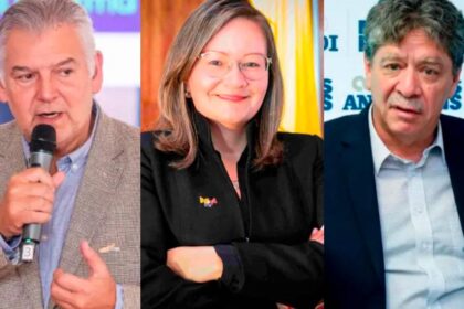 Empresarios colombianos en reunión de emergencia analizando las siete solicitudes técnicas de la SIC sobre márgenes de ganancia y estrategias comerciales