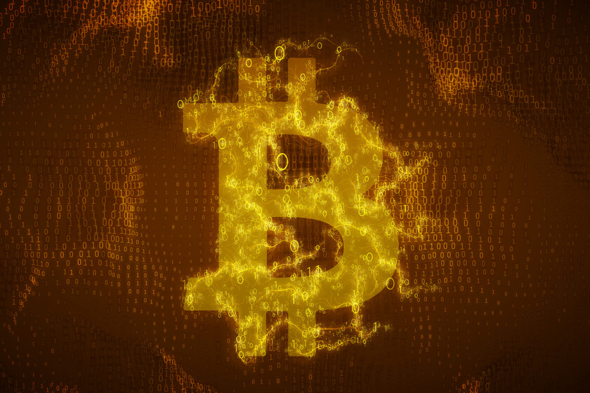 Gráfico en rojo mostrando el desplome de Bitcoin de US$124.000 a US$67.000 en menos de un año con liquidaciones masivas